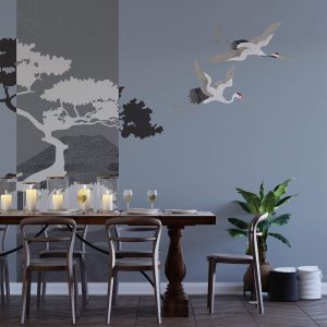 Papier peint Couple de grues volant près d’un arbre